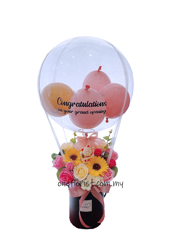 Table flower arrangement with balloon rose